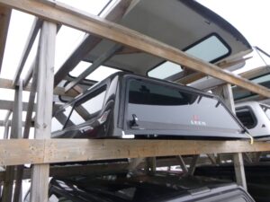 Dodge Ram 6’4 PUG Black Gold CREW Cab Leer 100R Truck Cap