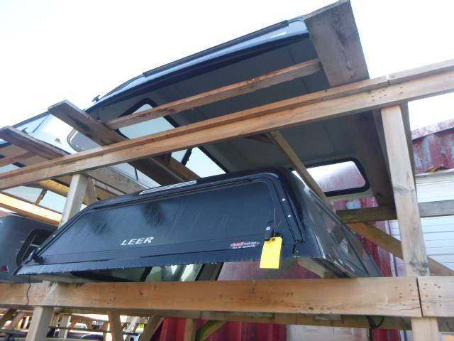 2019 – 2026 GMC Sierra 5’8 1500 GBA Black Leer 100R Truck Cap - Image 2