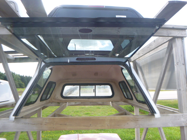 2005 – 2015 Toyota Tacoma 5’2 1E7 Silver High Rise Truck Cap - Image 3
