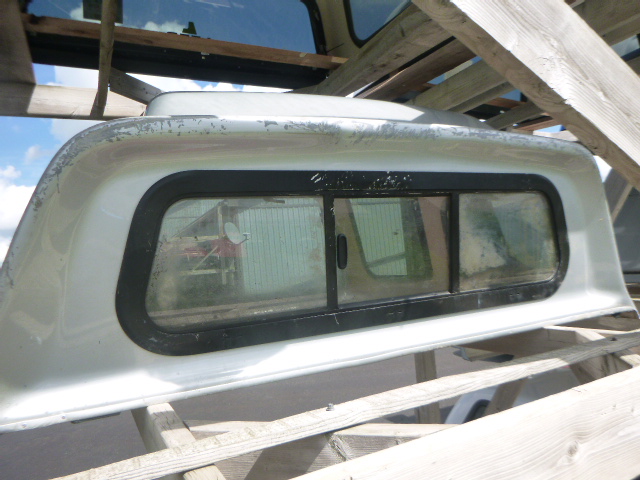 2005 – 2015 Toyota Tacoma 5’2 1E7 Silver High Rise Truck Cap - Image 8
