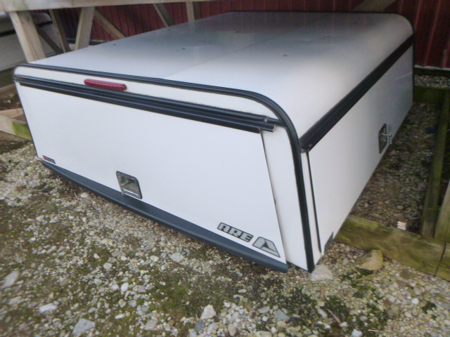2014 – 2018 GMC Sierra or Chevrolet Silverado 5’8 White ARE Contractor Truck Cap