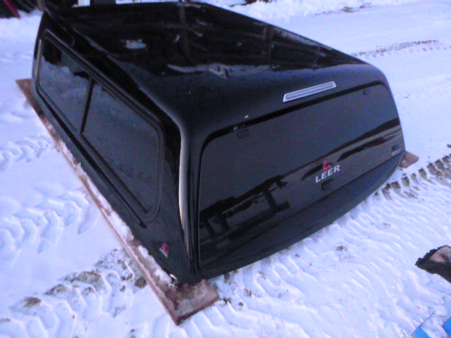 2019 – 2026 Dodge Ram 6’4 New Body Style PXJ Diamond Black Leer100XR Truck Cap