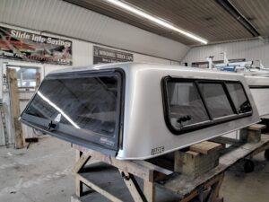Chevrolet Silverado or GMC Sierra 6’6 GAN Silver ARE Truck Cap