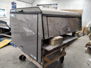 Dodge Ram 5’7 PFA Driftwood Satin Glow ARE Contractor Truck Cap