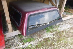 2007-2013 GMC Sierra Crew Cab Burgandy 6’6 ARE Truck Cap